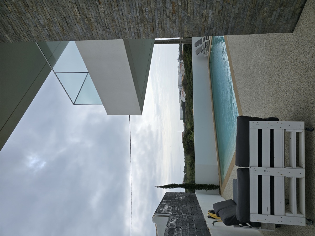 Terrace and pool with lounge area and sea view