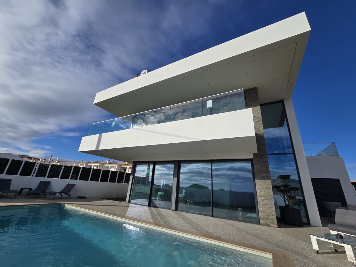 Villa exterior with pool and modern architecture